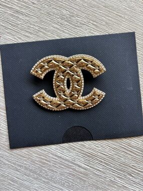 Authentic CHANEL Gold Quilted Interlocking CC Brooch with Crystal Trim